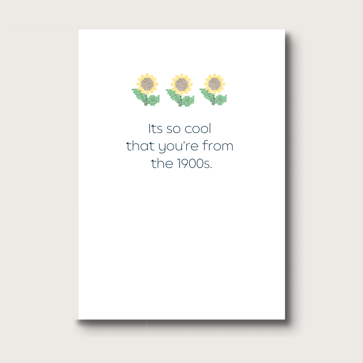 Card with three crossstitched sunflowers and print underneath them that reads "Its so cool you're from the 1900s"