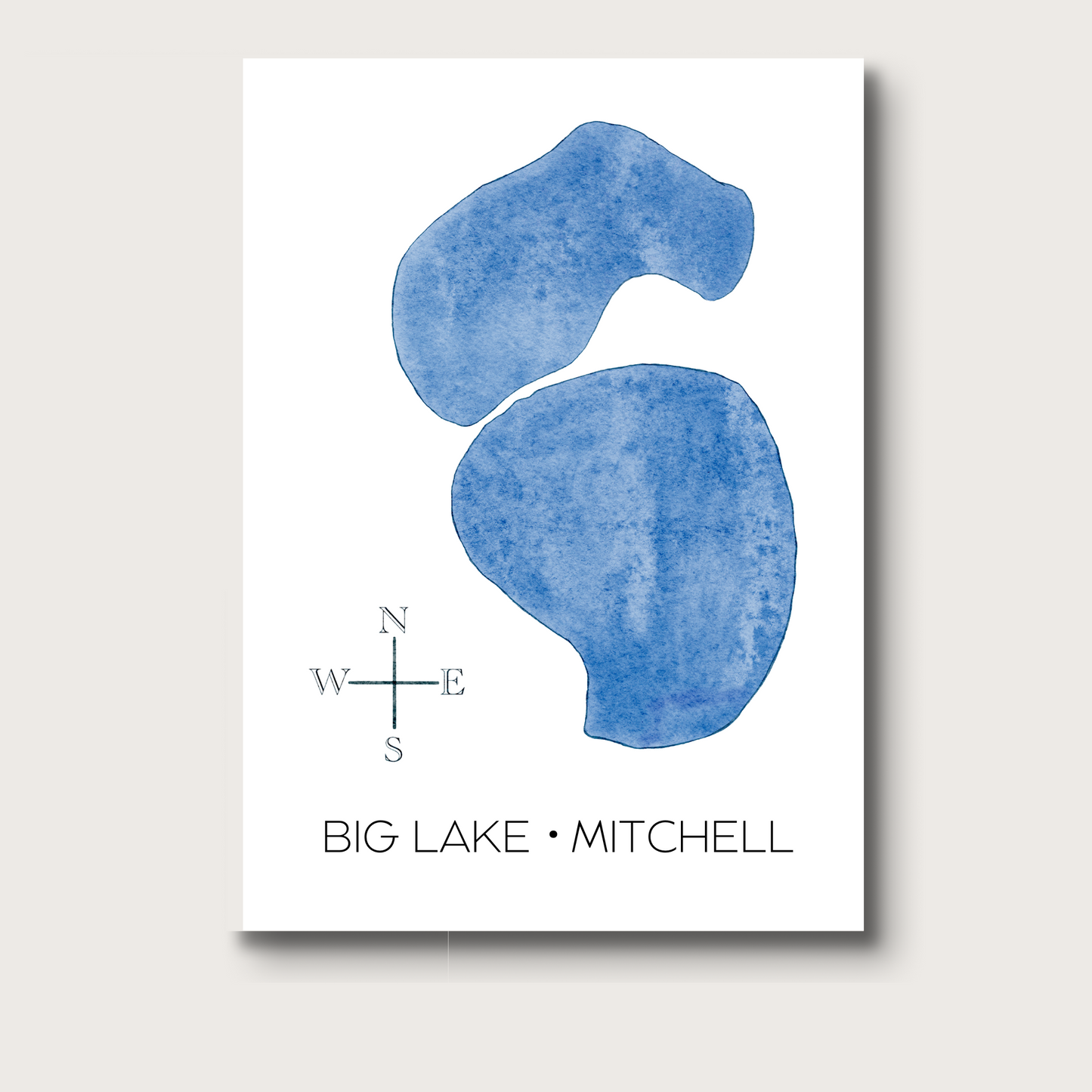 Greeting card with the lakes of Big Lake and Lake Mitchell in blue, titles printed below, and compass.