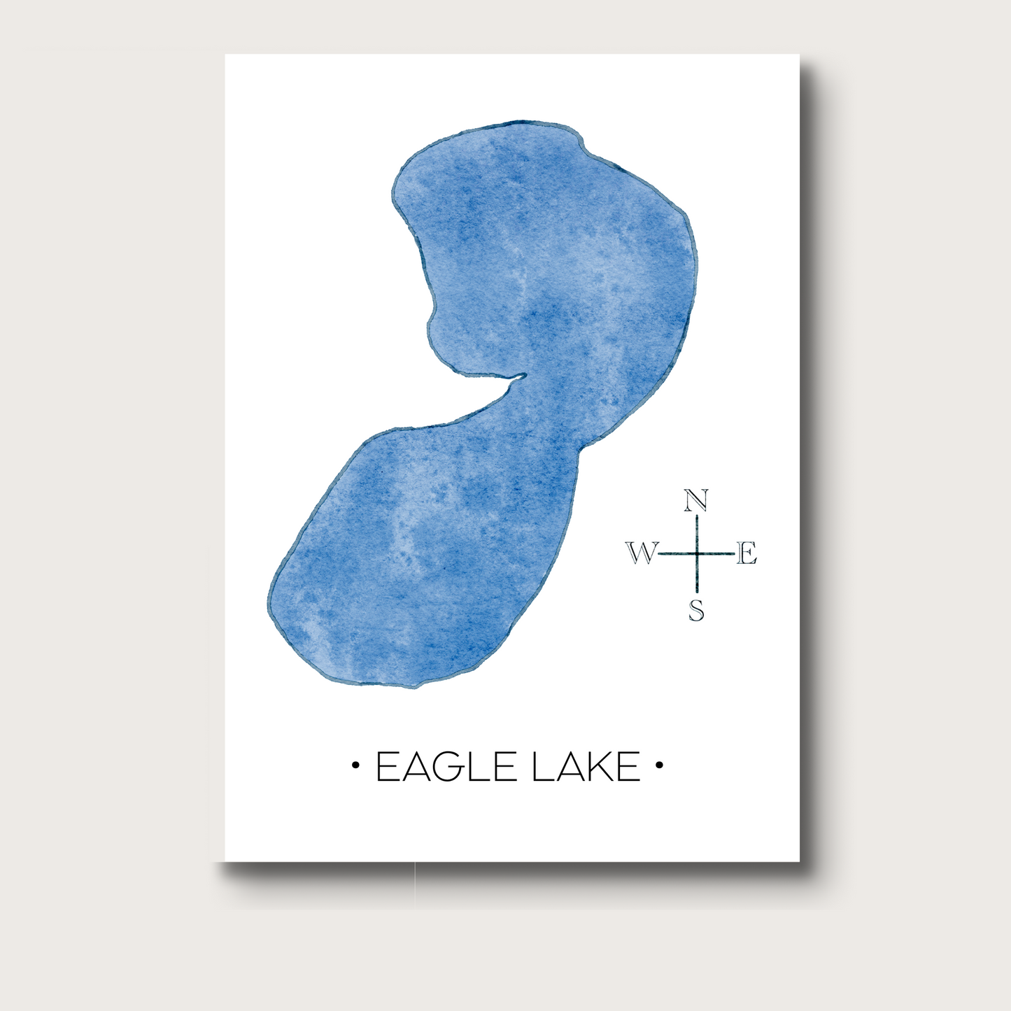 Map of Eagle Lake with blue watercolor design on a white background. Compass and Eagle Lake printed below.