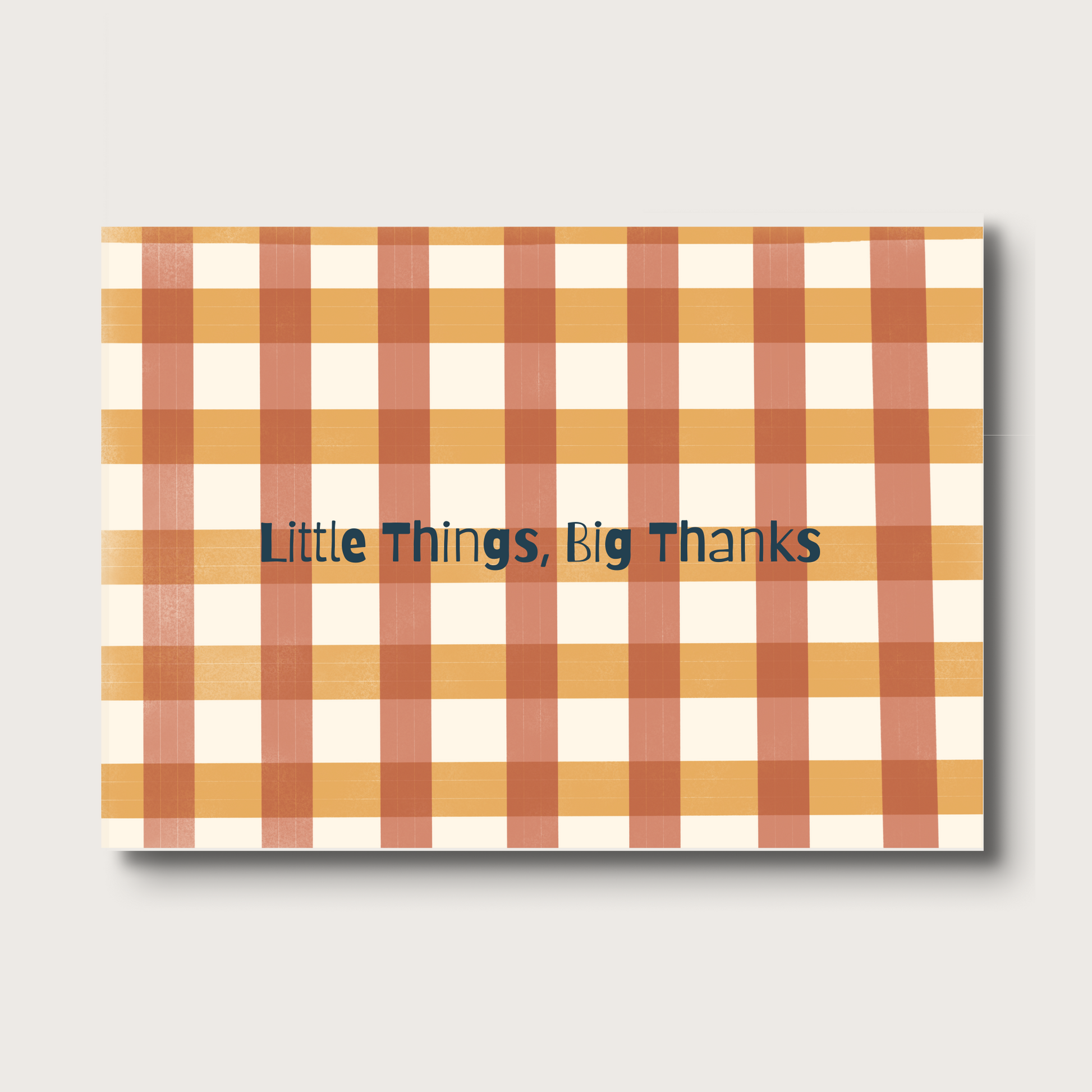 Note card with plaid pattern and 'Little Things, Big Thanks' text on a light  background