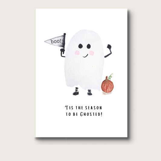 Halloween-themed greeting card with a ghost character and text that reads 'Tis the Season to be Ghosted' on a white background