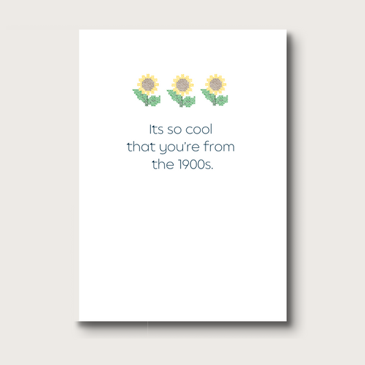 Card with three crossstitched sunflowers and print underneath them that reads "Its so cool you're from the 1900s"