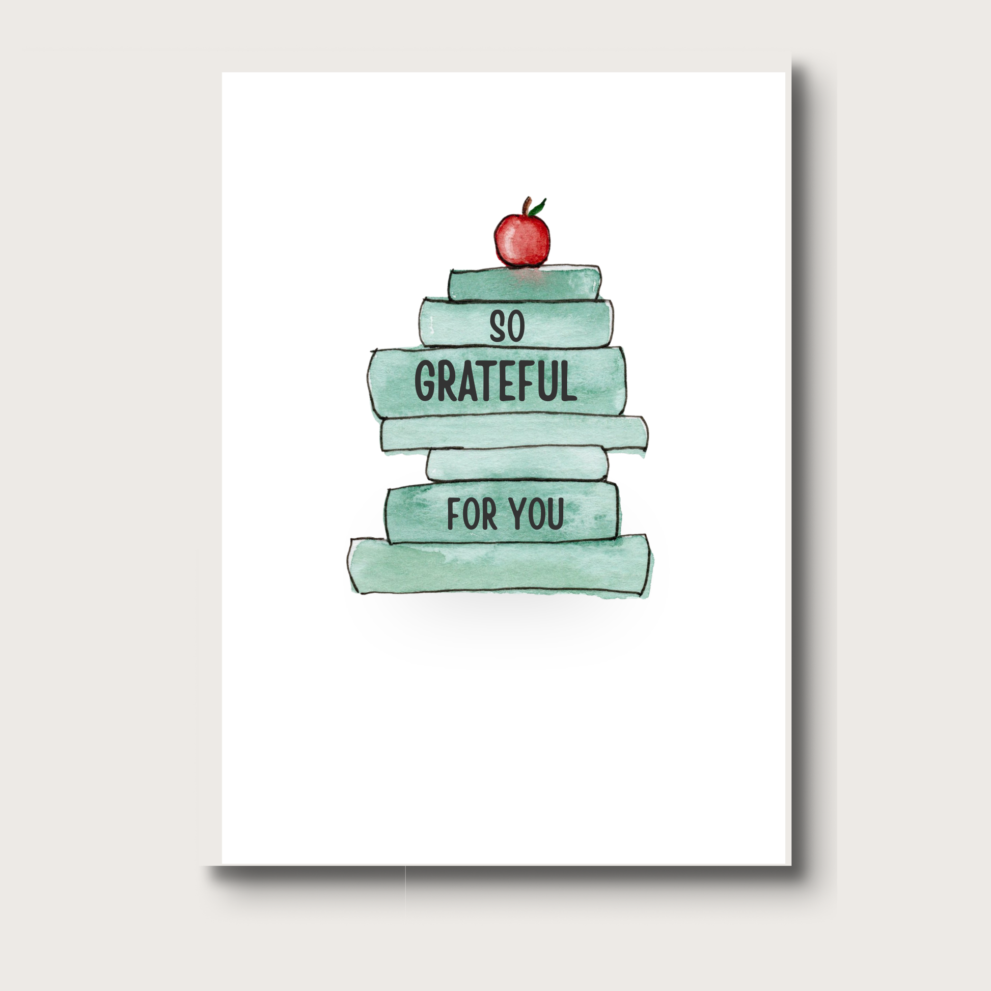 A stack of green books that has "So Grateful for You" with an apple stacked on top on a white background. 