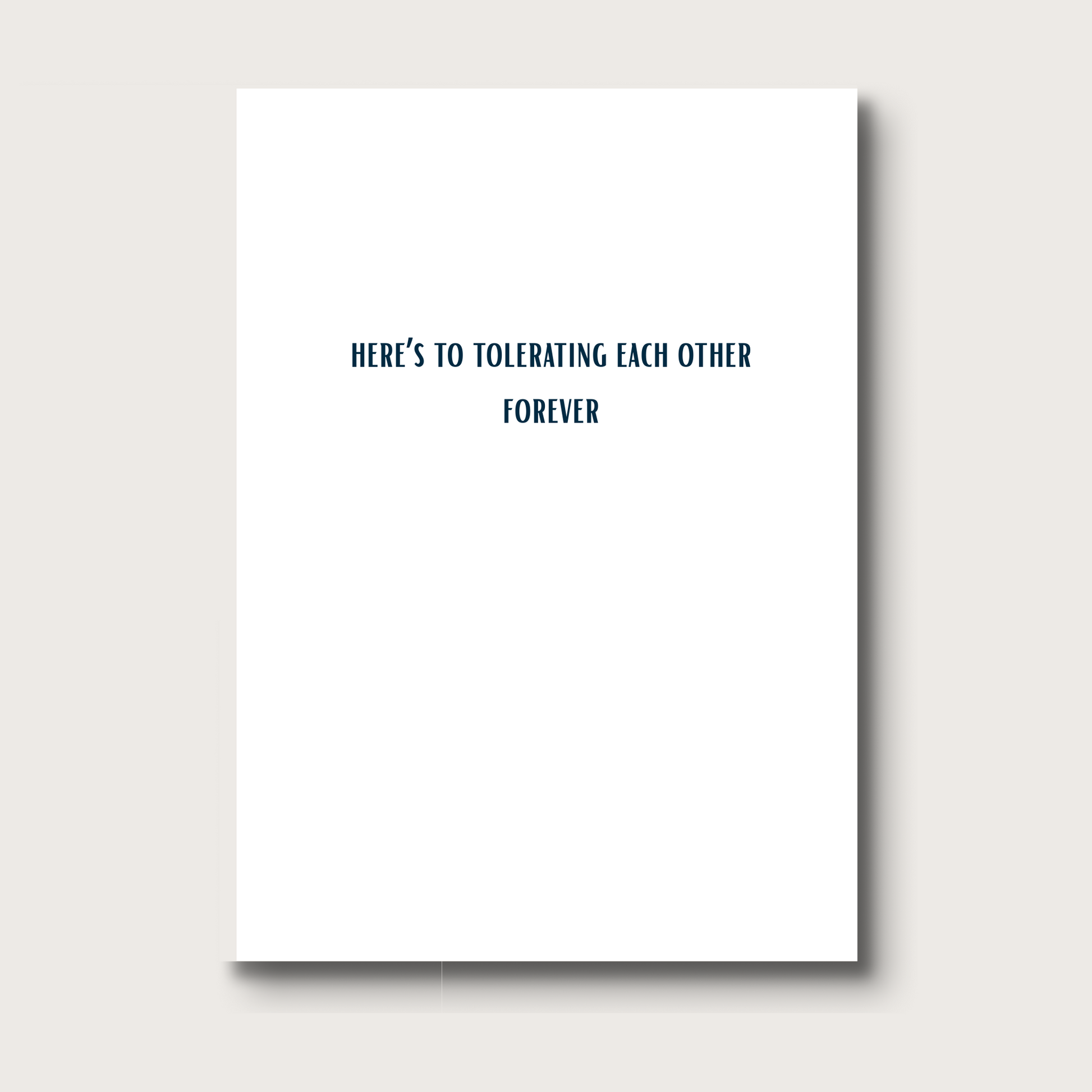 Inside of the card reads "Here's to tolerating each other forever." 