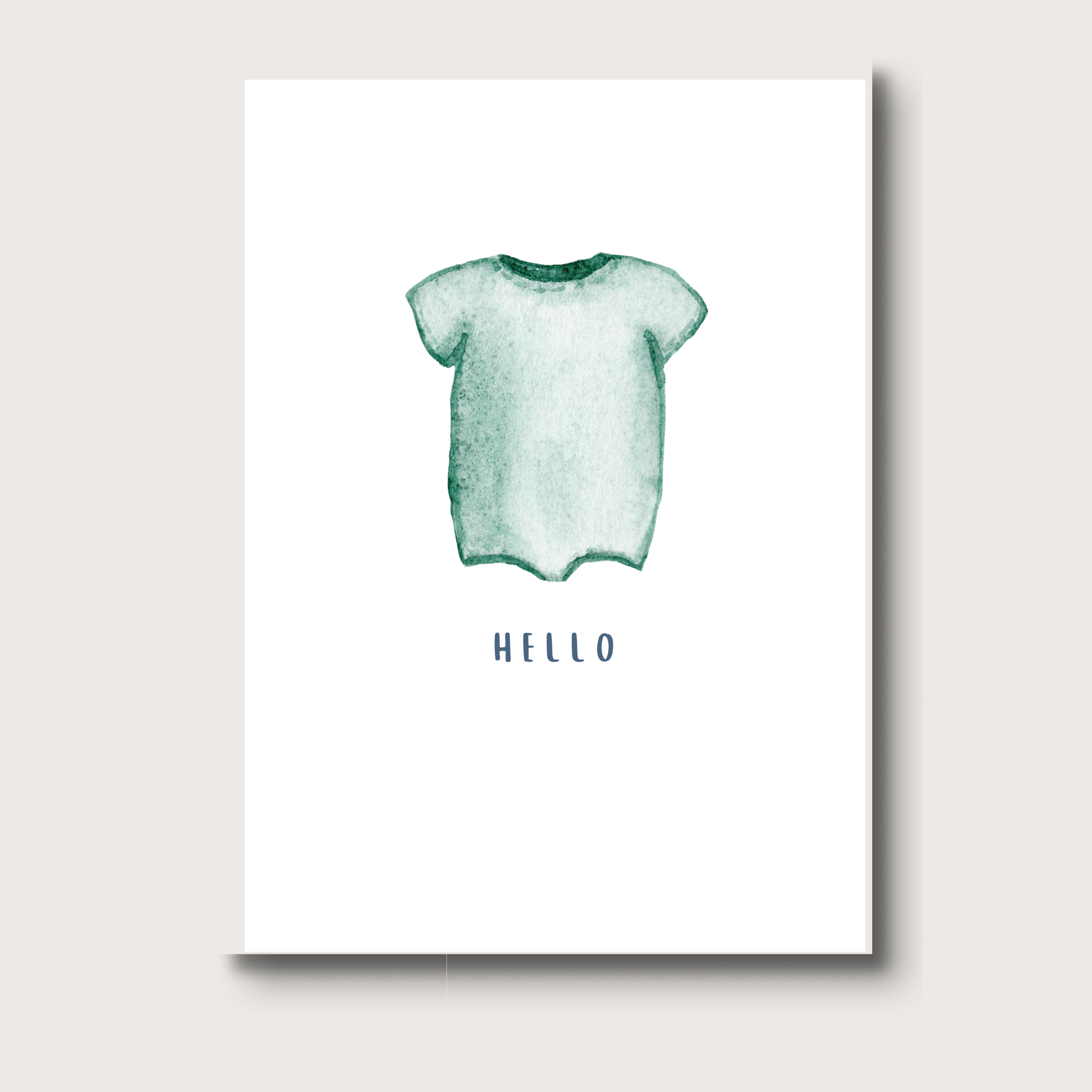 Greeting card of a turquoise baby onesie with 'HELLO' text on a white background