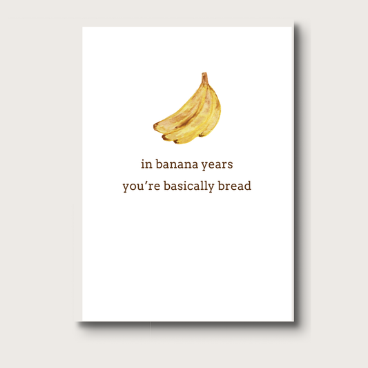 Card with a banana watercolor and humorous text on a white background