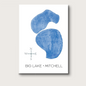 Greeting card with the lakes of Big Lake and Lake Mitchell in  blue, titles printed below, and compass.