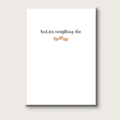 Notebook with text 'And for everything else' and three small cookie illustrations on a white background