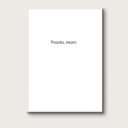 White card with 'Thanks, Mom.' text 