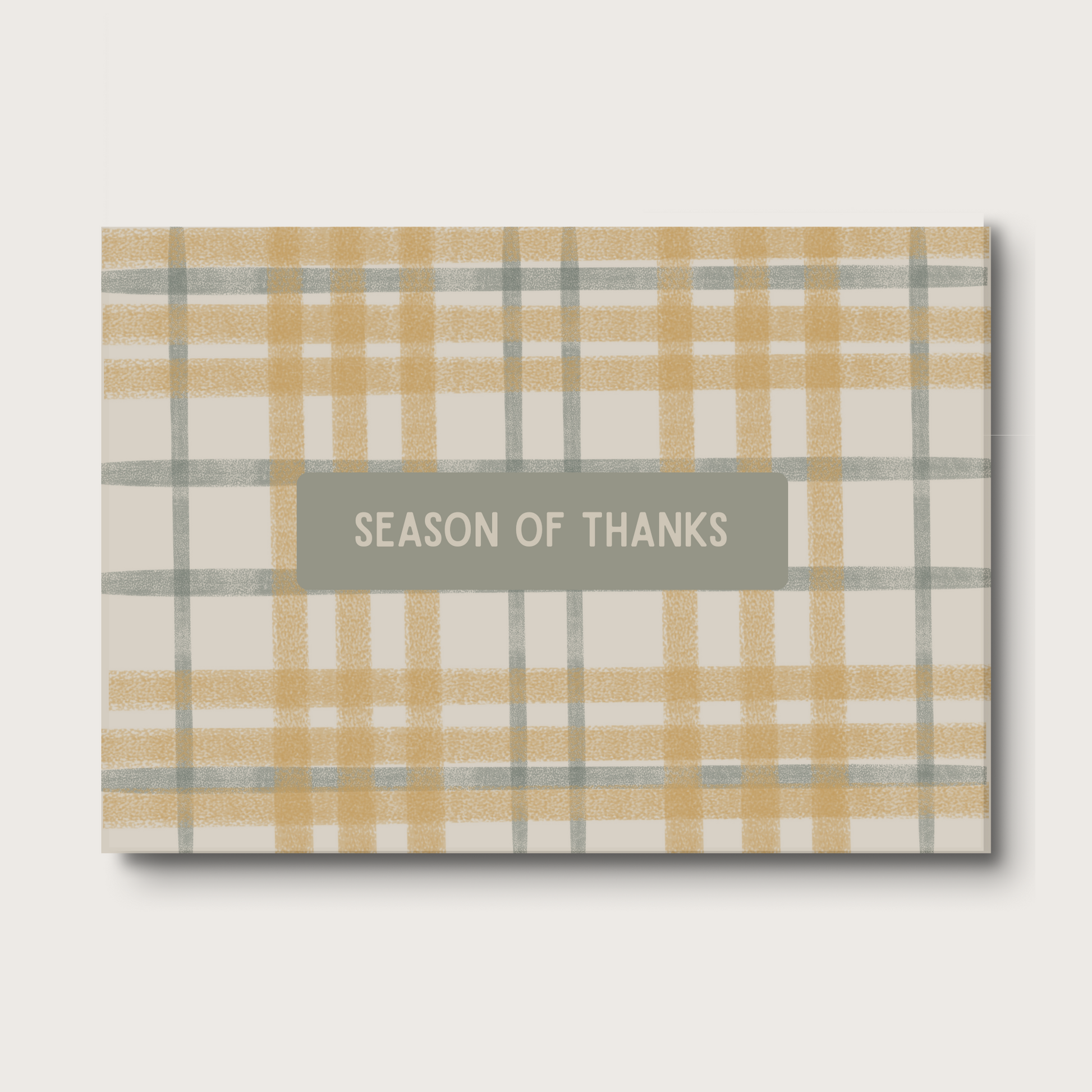 Plaid card with 'Season of Thanks' text on a soft background
