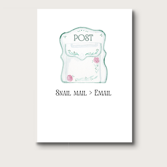 A watercolor illustration of a vintage style mailbox that would be found on the side of a house. The word "POST" is printed in green on the top of the box. The box is white, detailed in green edges, and pink flowers. Underneath the image in black print reads the text "Snail Mail > Email" A beautiful card to celebrate a new home! 