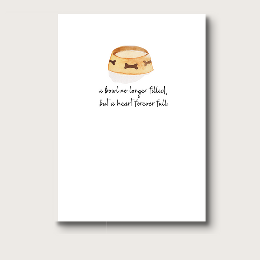 Card with an empty dog bowl watercolor and text on a white background that reads: "a bowl no longer filled, but a heart forever full." 