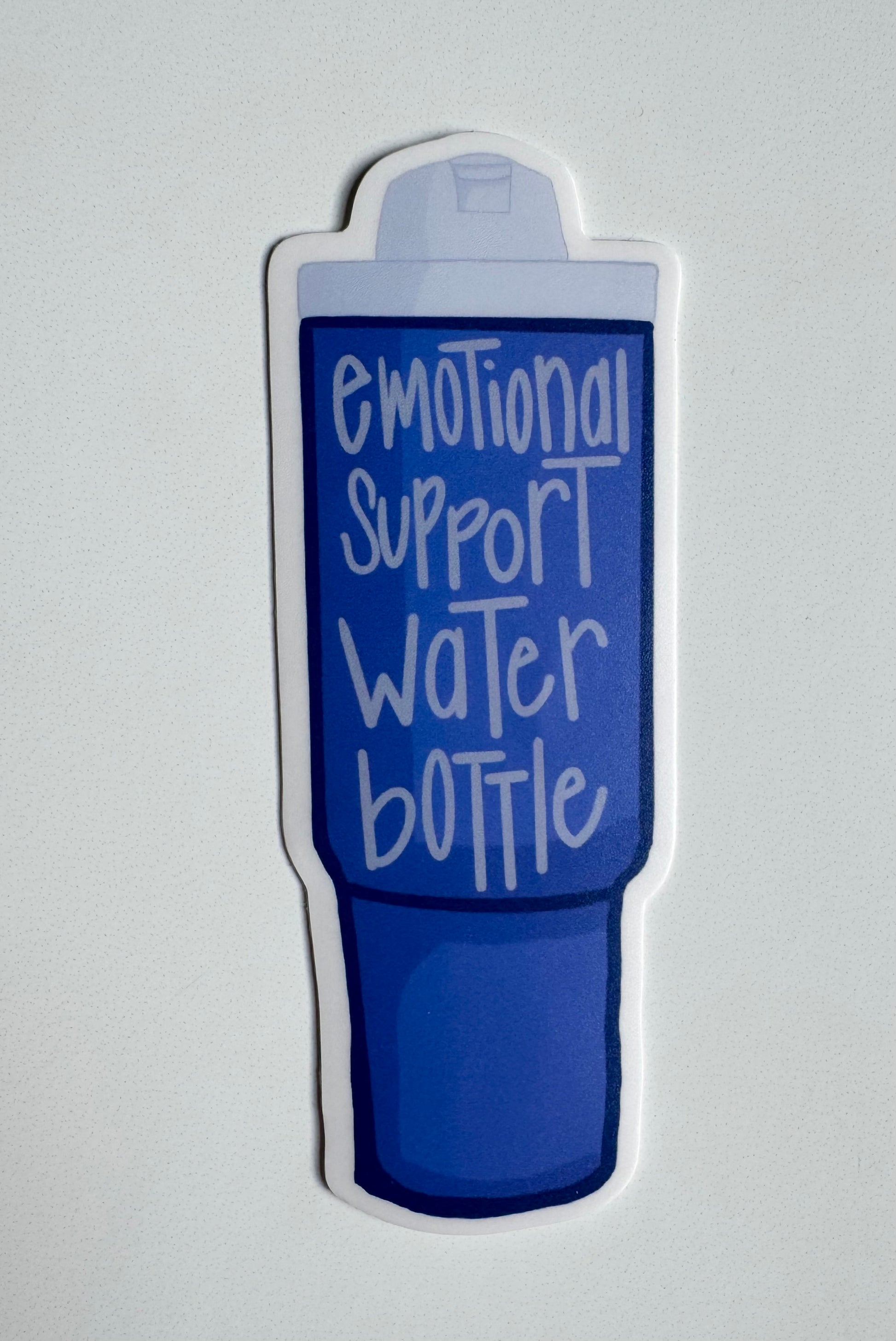 Blue water bottle-shape sticker with 'emotional support water bottle' text on a white background