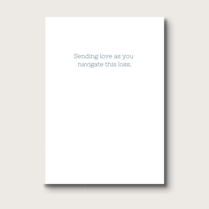 White card with text 'Sending love as you navigate this loss.'