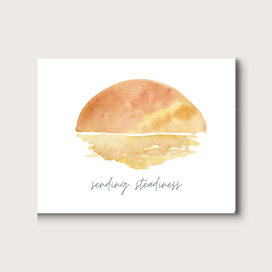 Art print with a watercolor depiction of a setting or rising sun and the text 'sending steadiness' on a white background.